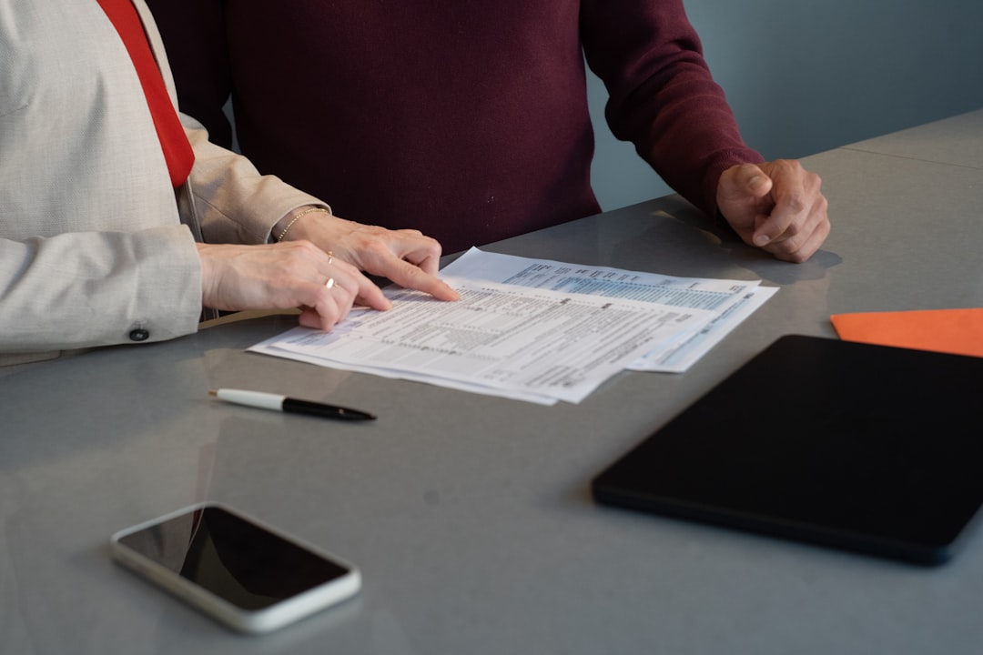 Business professionals reviewing documents
