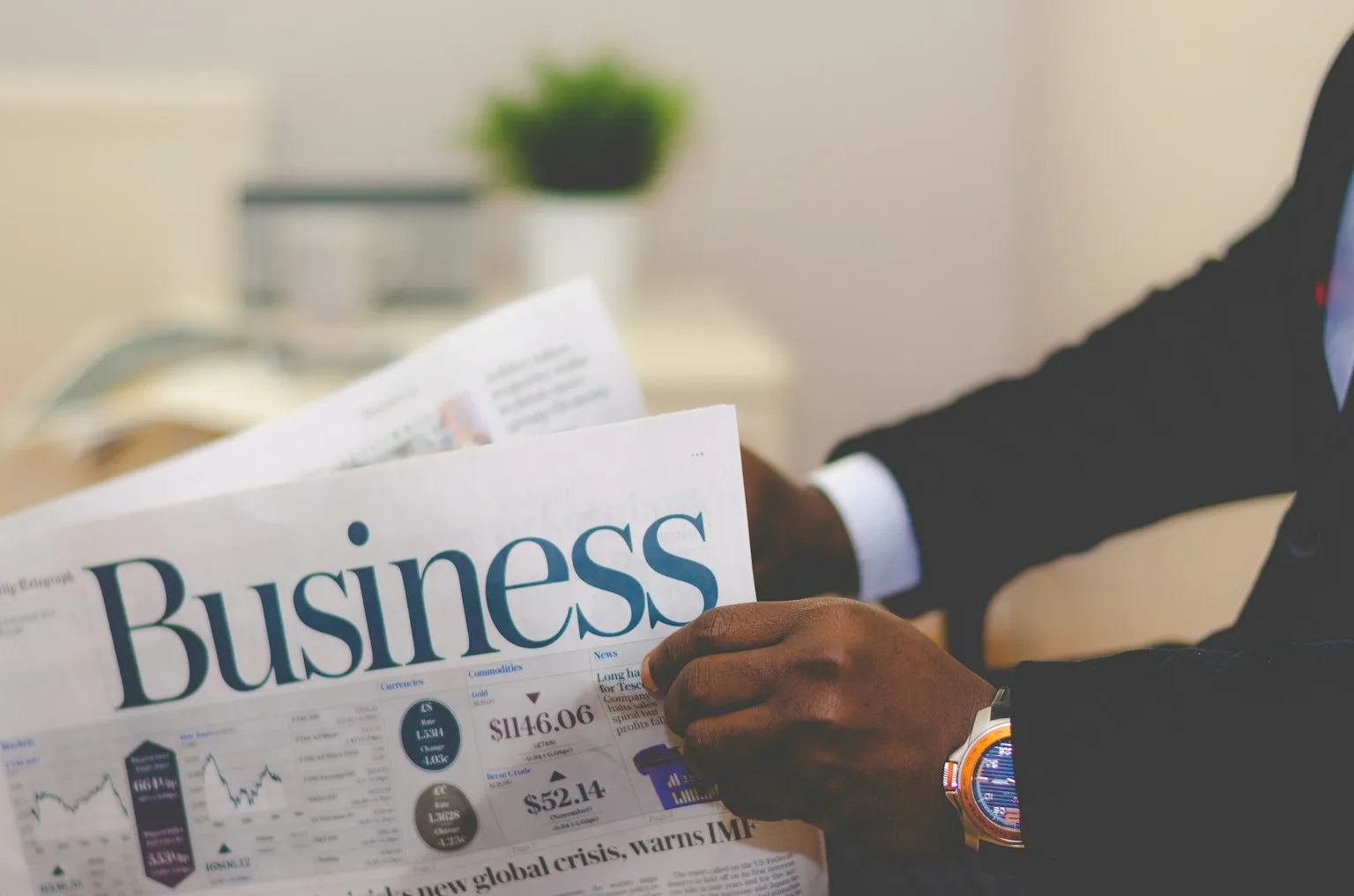 Business professional reviewing SBA 7(a) and 504 loan documents for multi-unit franchise financing