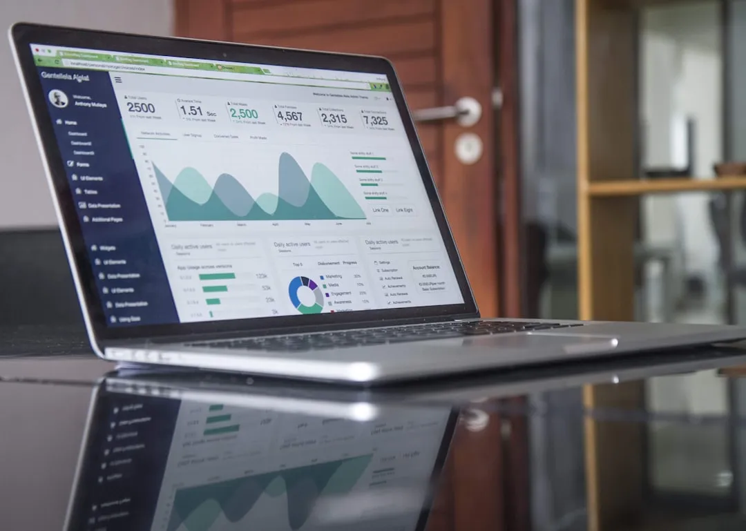 Investor reviewing franchise financial comparison data on laptop