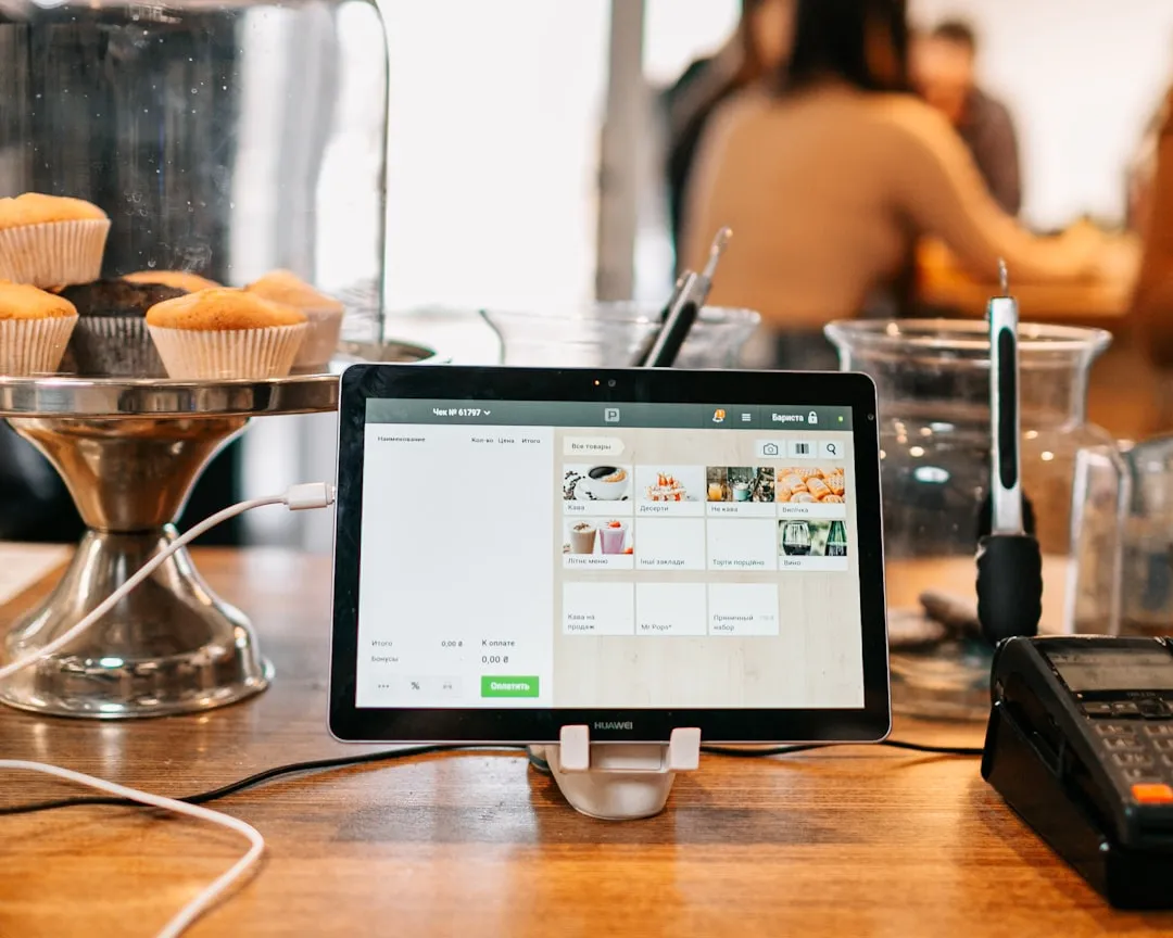 Tablet POS system on a stand at a retail counter