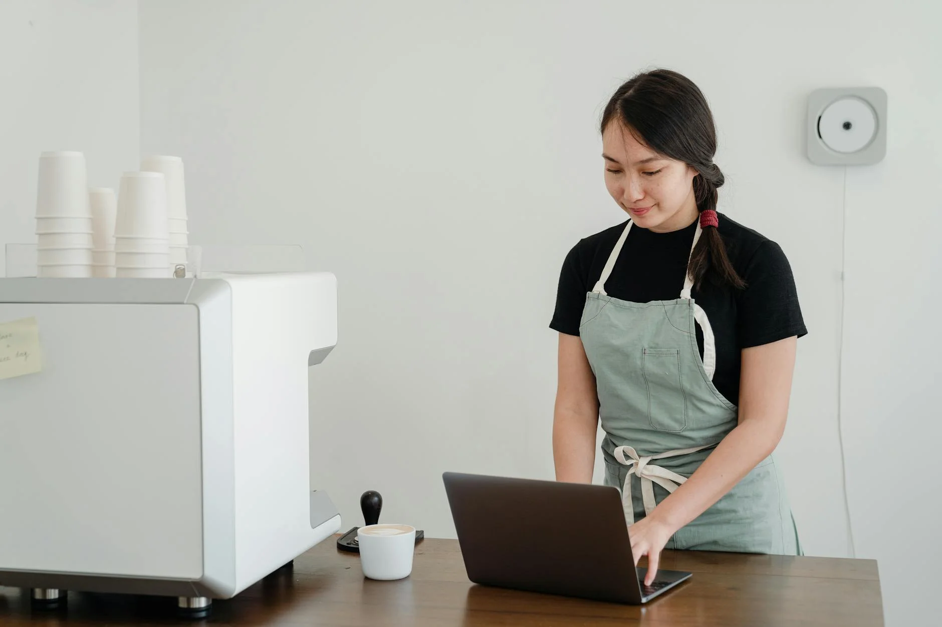 Business owner reviewing financial spreadsheet