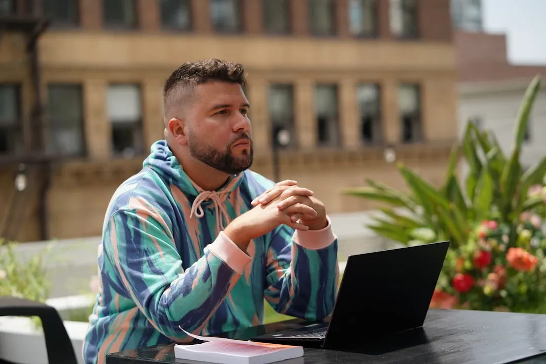 Entrepreneur reviewing financial projections and cash flow spreadsheet