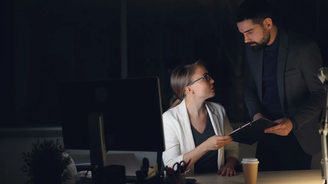 Professional reviewing franchise legal documents in an office setting