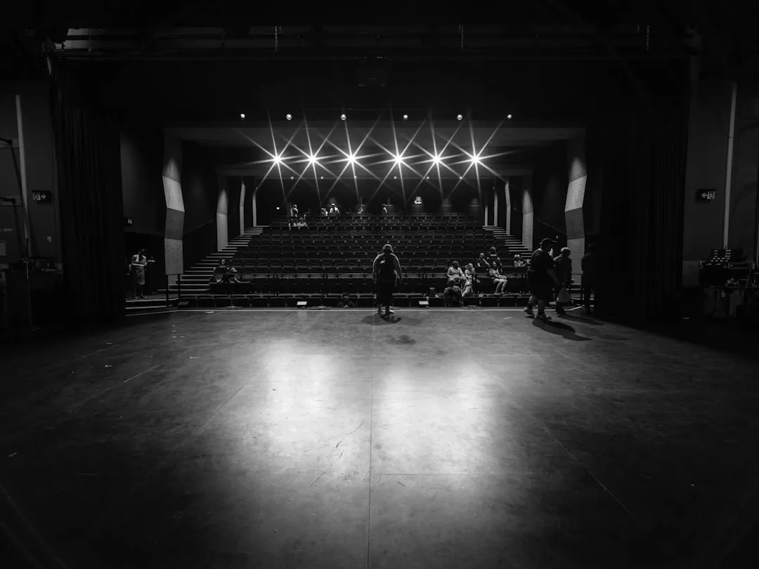 Students performing on stage during a seasonal show