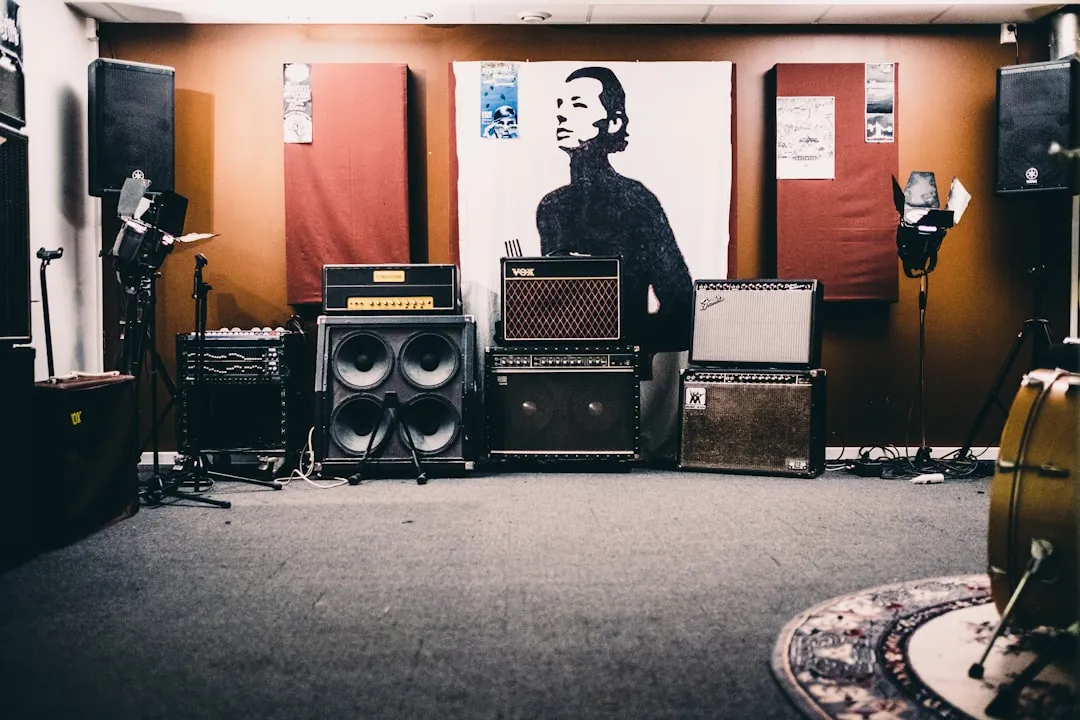 Interior of a music education studio showing rehearsal room layout and equipment